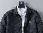 Quilted jacket with white shirt, black with logo chest detail and gold buttons