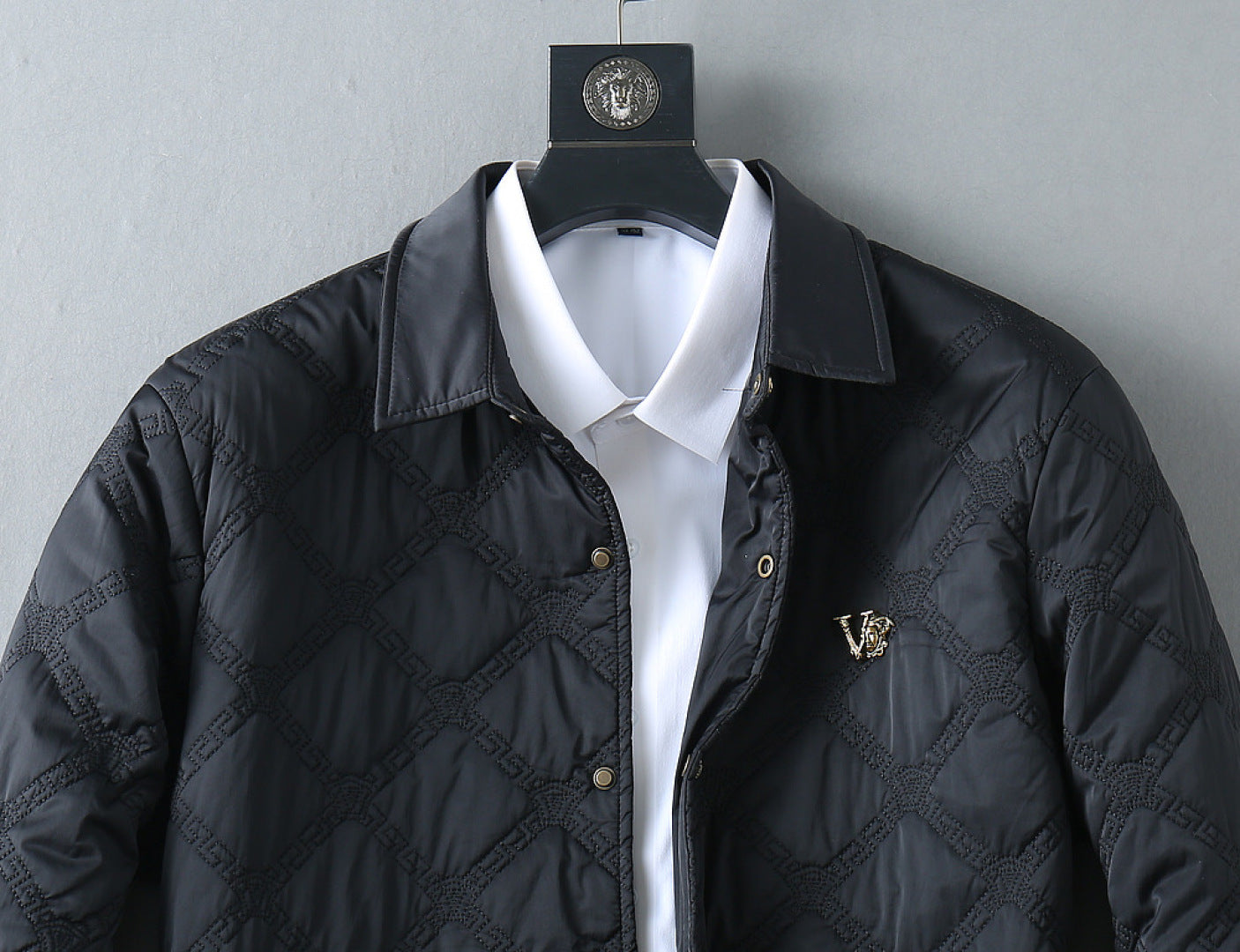 Quilted jacket with white shirt, black with logo chest detail and gold buttons