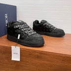 Dior unisex low-top quilted sneakers, black with monogram strap and lace-up