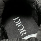 Dior sneaker insole lining, black fabric with white DIOR lettering