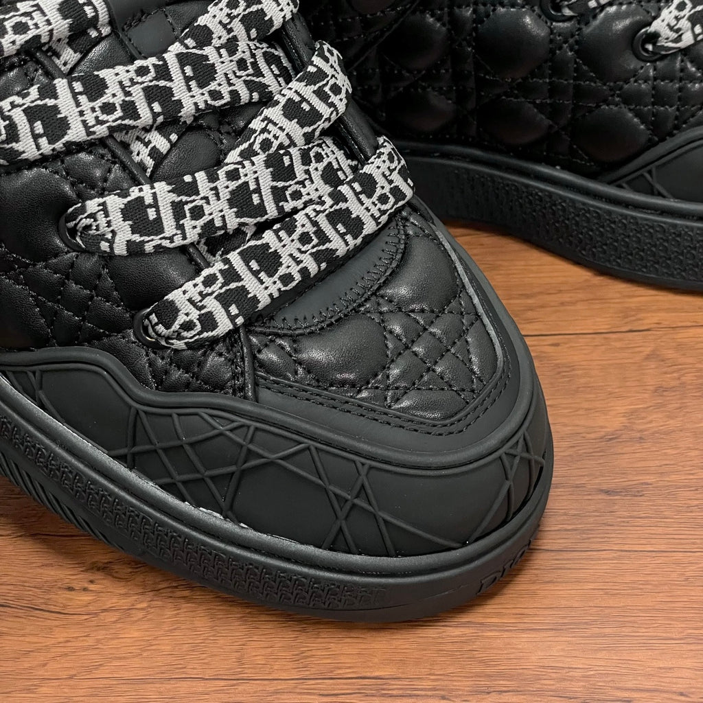 Dior unisex quilted sneaker, black with monogram strap and rubber tread sole