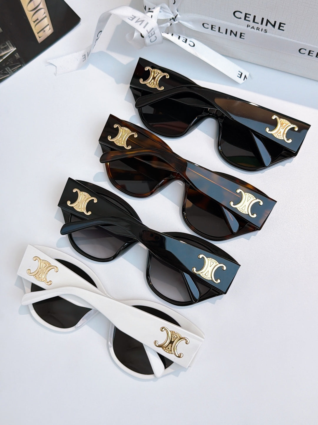 Celine cat-eye sunglasses set with mixed frames: black, dark tortoiseshell, and white