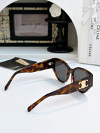 Celine cat-eye sunglasses with tortoiseshell frame and dark lenses, side profile