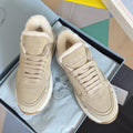 Prada unisex suede sneaker with white faux-fur lining and lace-up front