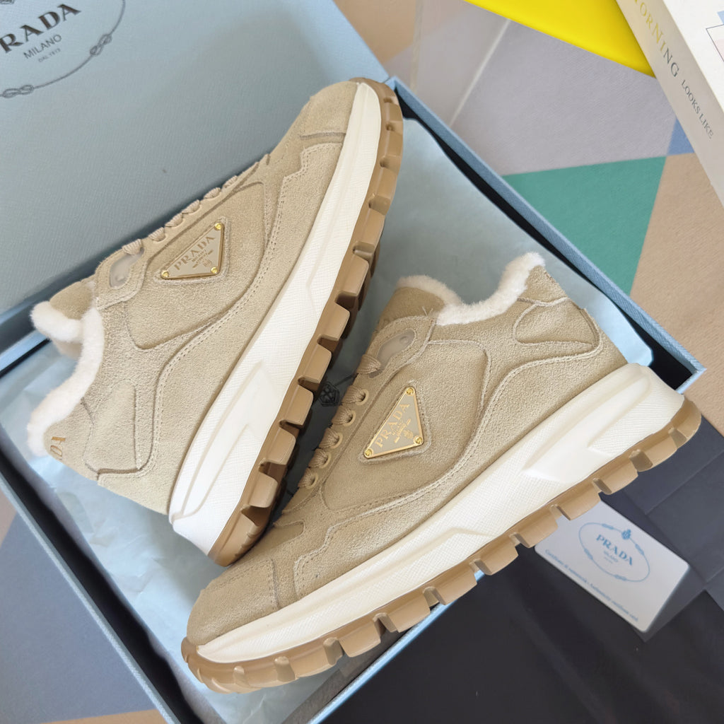 Prada unisex beige suede sneaker pair with white sole and faux-fur lining