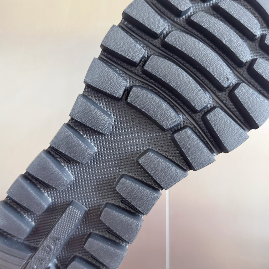 Prada sneaker outsole tread with block pattern, dark gray