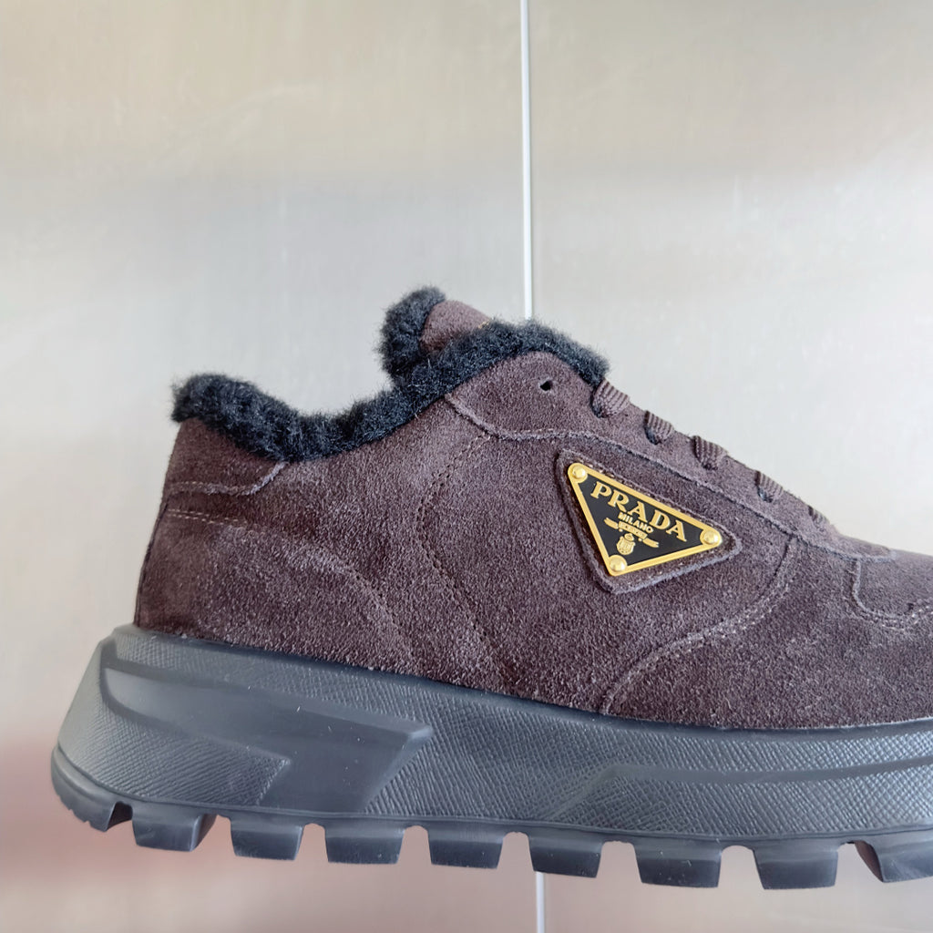 Prada suede sneaker with logo patch and lug sole, brown, side close-up