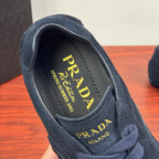 Navy Prada sneaker insole with PRADA lettering and lace-up shoe upper