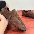 Brown suede lace-up sneaker with oval side panel and PRADA mark