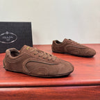 Brown suede lace-up sneakers with side logo detailing