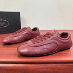 Prada unisex leather sneakers, burgundy, lace-up with sculpted toe and side panels