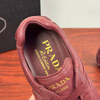 Prada unisex sneaker interior in burgundy leather with PRADA logo and lining