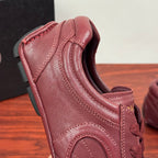 Prada unisex leather sneaker burgundy, close-up heel collar and seam lines