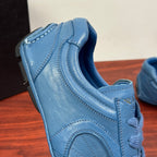 Light blue unisex sneaker heel with padded collar and side seam stitching