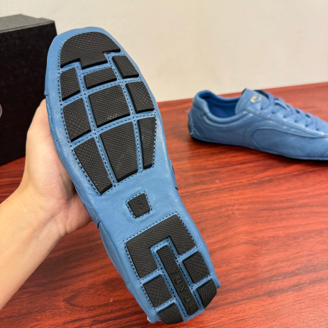 Light blue unisex sneaker outsole with grid tread and raised rubber sections