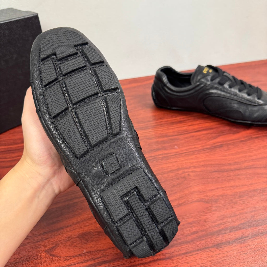 Prada unisex sneakers, outsole view, textured rubber tread with geometric pattern