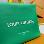 Louis Vuitton green tote bag close-up of front logo and Maison Founded text