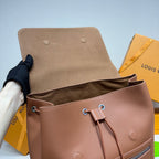 Men’s Louis Vuitton backpack top opening view with drawstring cords and metal eyelets