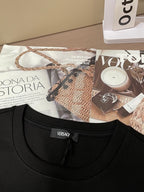 Black crewneck shirt with Versace neckline label