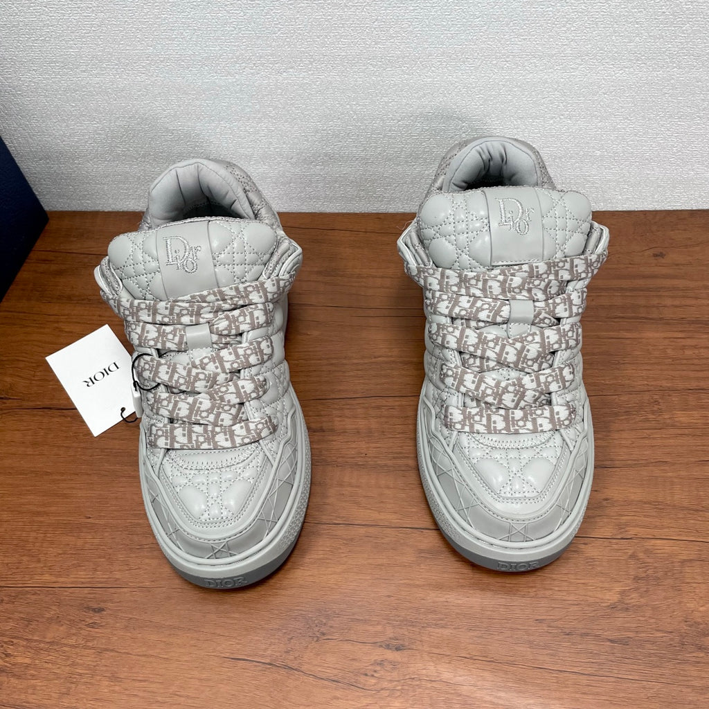 Dior unisex low-top sneakers, rear view with quilted heel and lace-up collar