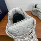 White quilted sneaker with padded collar and Dior D logo on strap