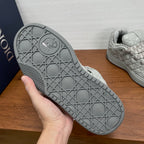 Dior sneaker outsole, grey rubber tread with geometric grid and round logo