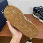 Dior sneaker outsole with textured geometric tread in tan/gold tone