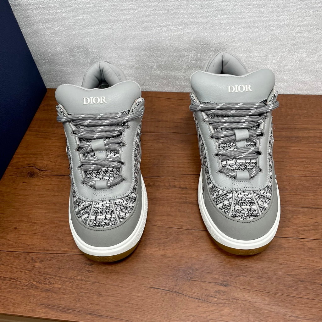 Dior unisex sneakers with DIOR on heel tab; gray patterned uppers and gray laces