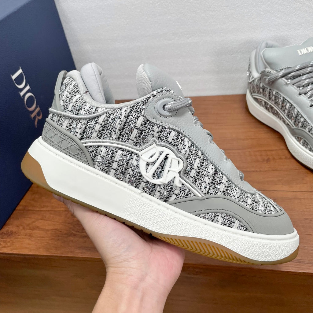 Dior unisex sneakers, gray textured upper with silver V emblem and white rubber sole