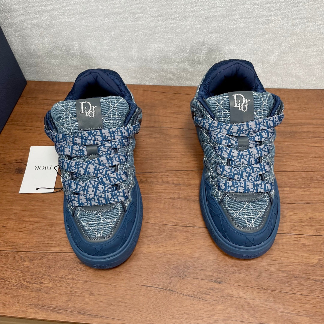 Unisex Dior sneakers, denim blue with Dior logo on heel, rear view