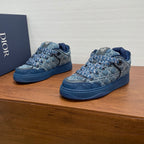 Unisex Dior sneakers with blue denim patterned upper and dark blue soles