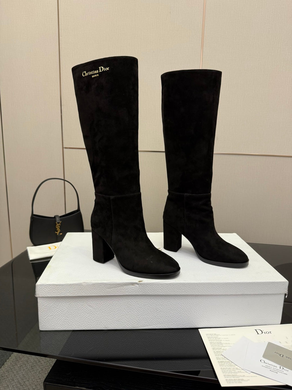 Black knee-high suede pull-on boots with block heels and rounded toe