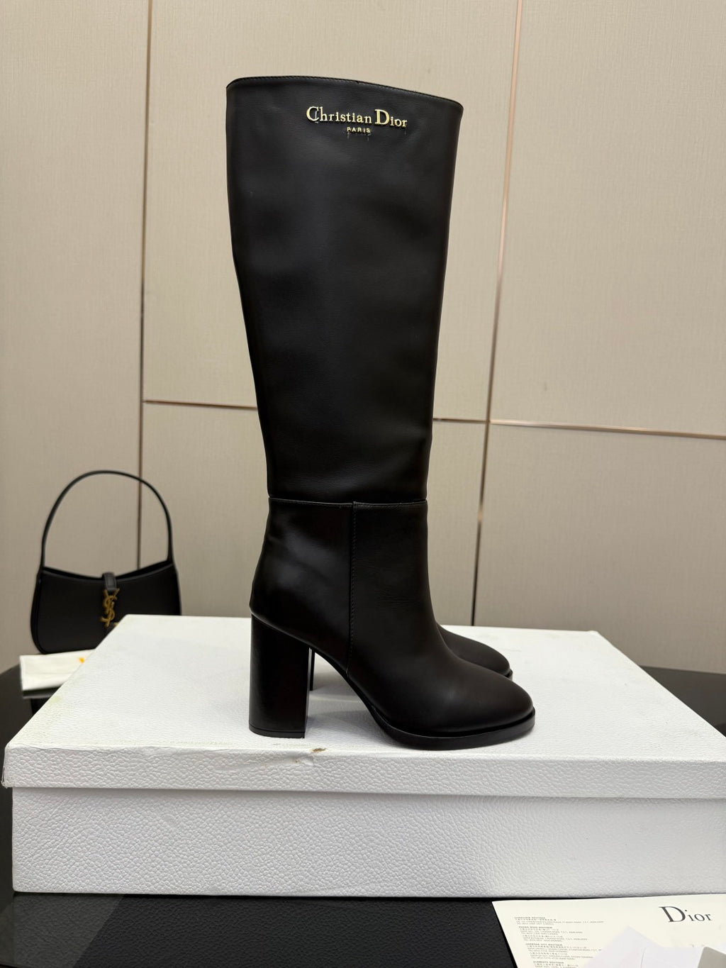 Black knee-high leather boot with block heel, pull-on top, Dior logo