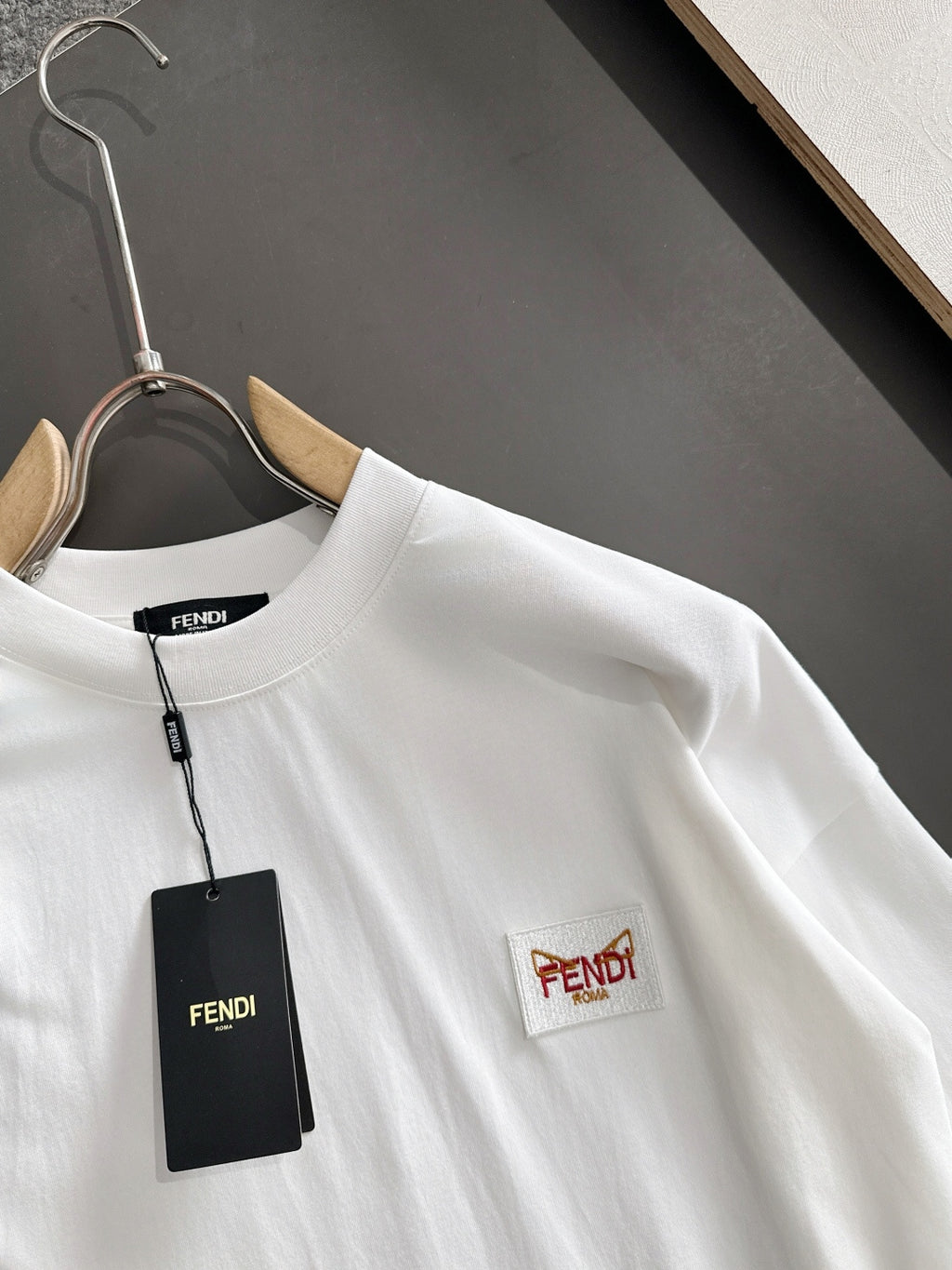 White long-sleeve shirt with round collar and FENDI logo patch