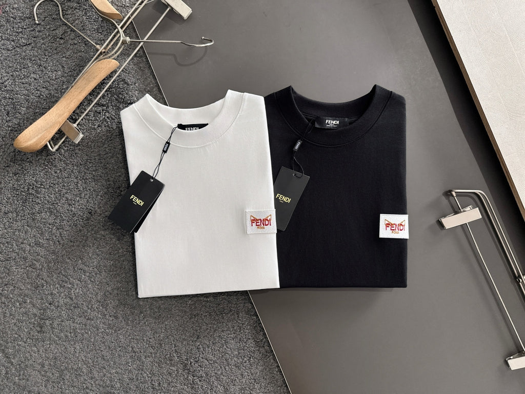 Set of white and black long-sleeve shirts with Fendi logo patches