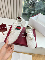Gucci low-top sneakers, white GG canvas with green-red side stripe and gold logo