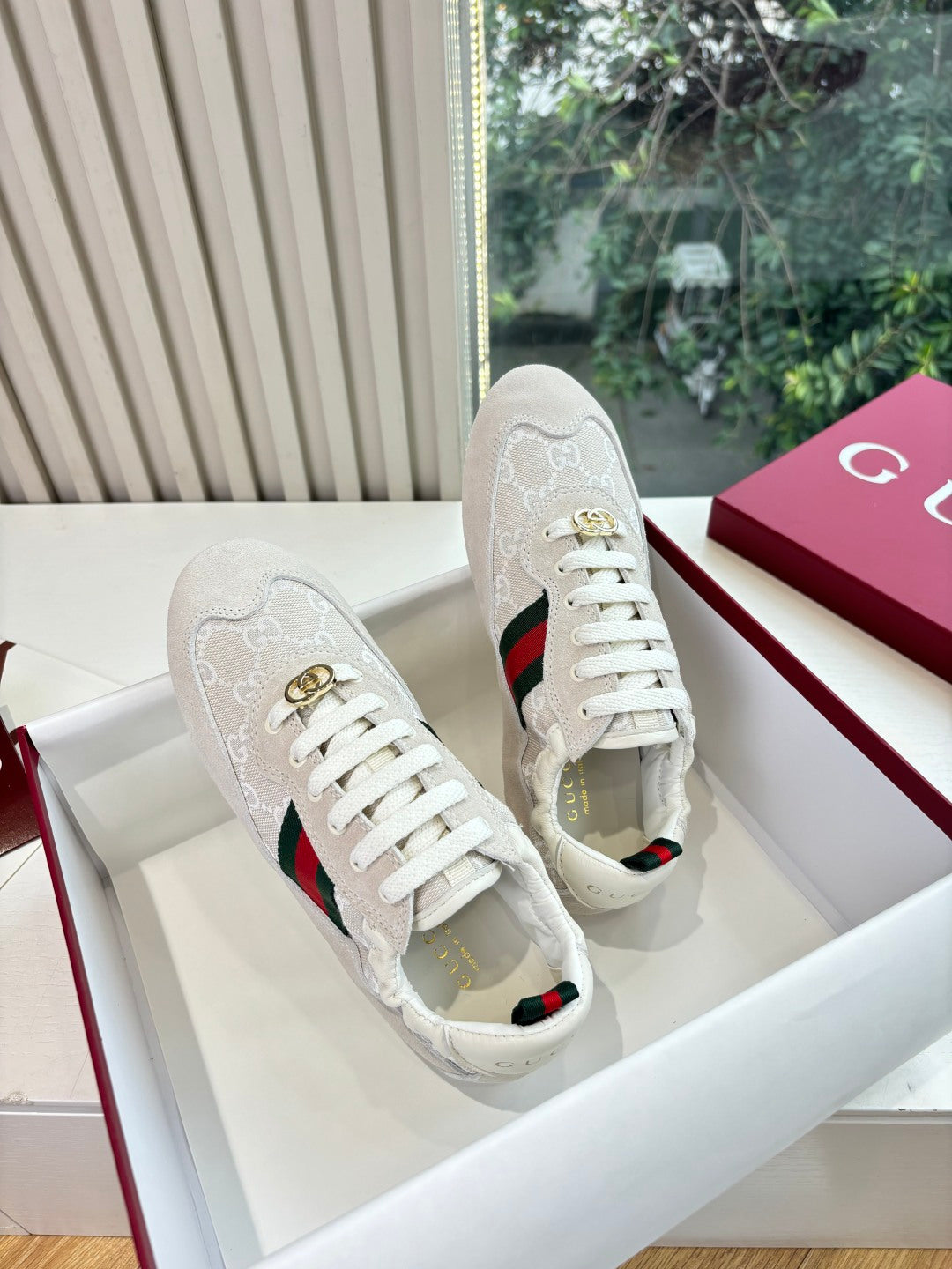 Gucci low-top sneakers, white with GG logo panels and green-red heel stripe