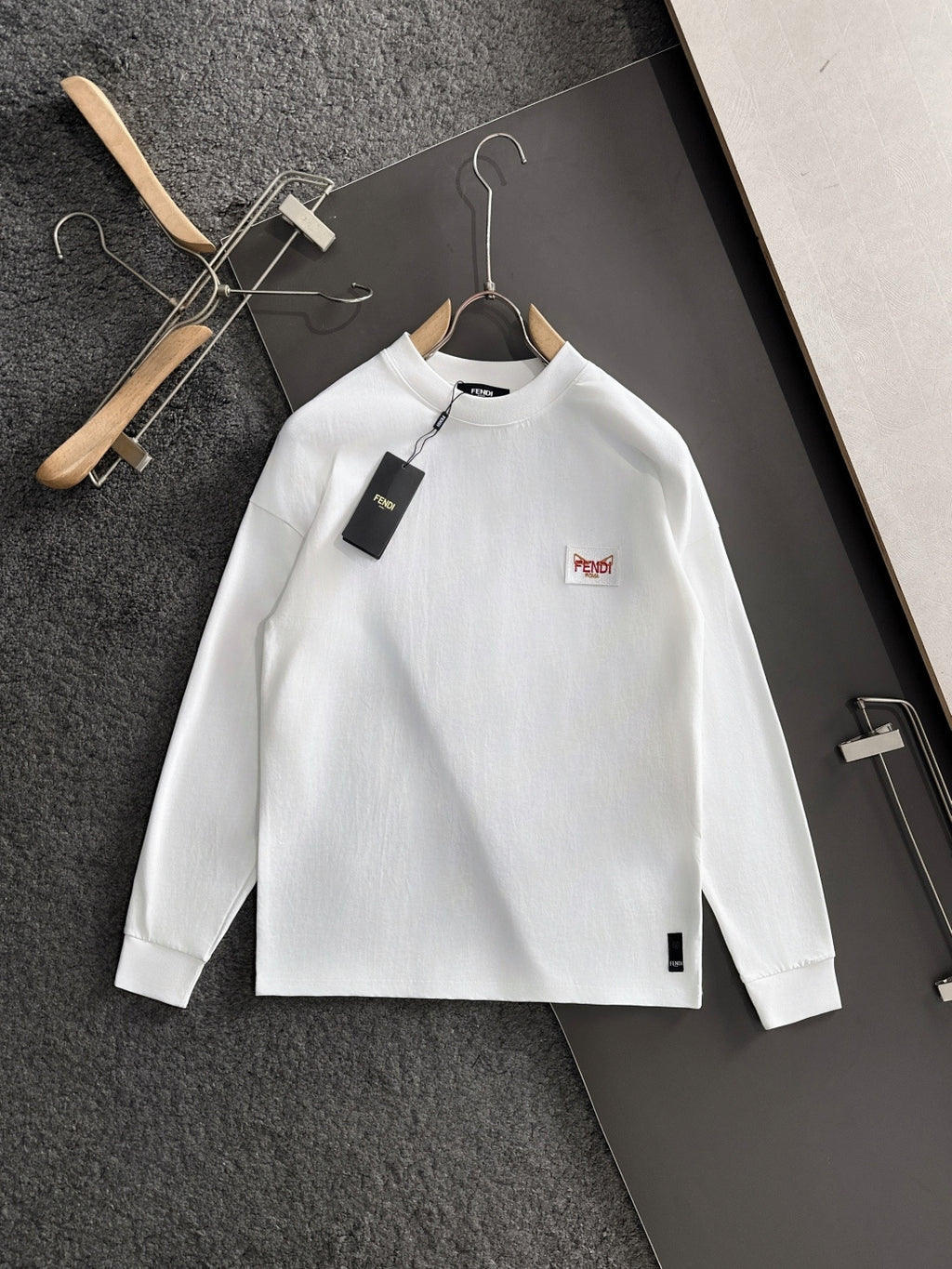 White long-sleeve shirt with Fendi logo patch and round collar