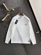 White long-sleeve shirt with Fendi logo patch and round collar