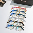 Assorted round eyeglasses with mixed gold, blue, tortoiseshell, and black frames