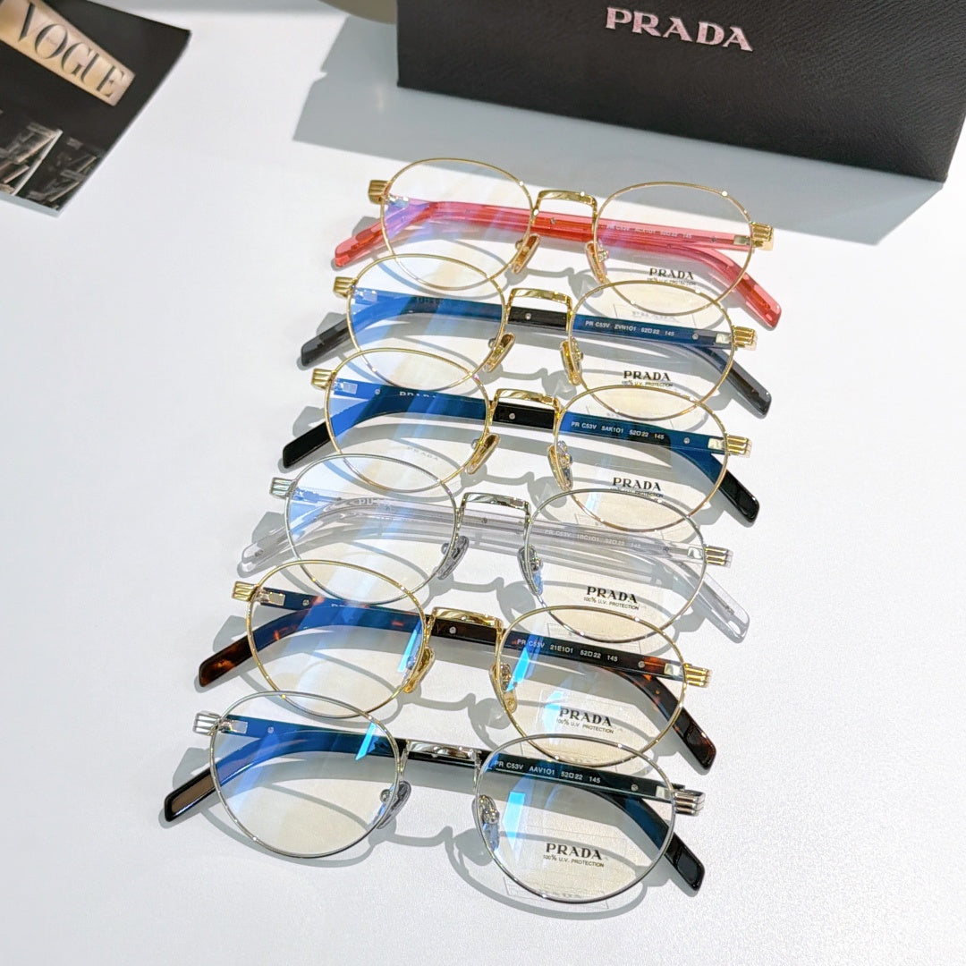 Assorted round eyeglasses with mixed gold, blue, tortoiseshell, and black frames