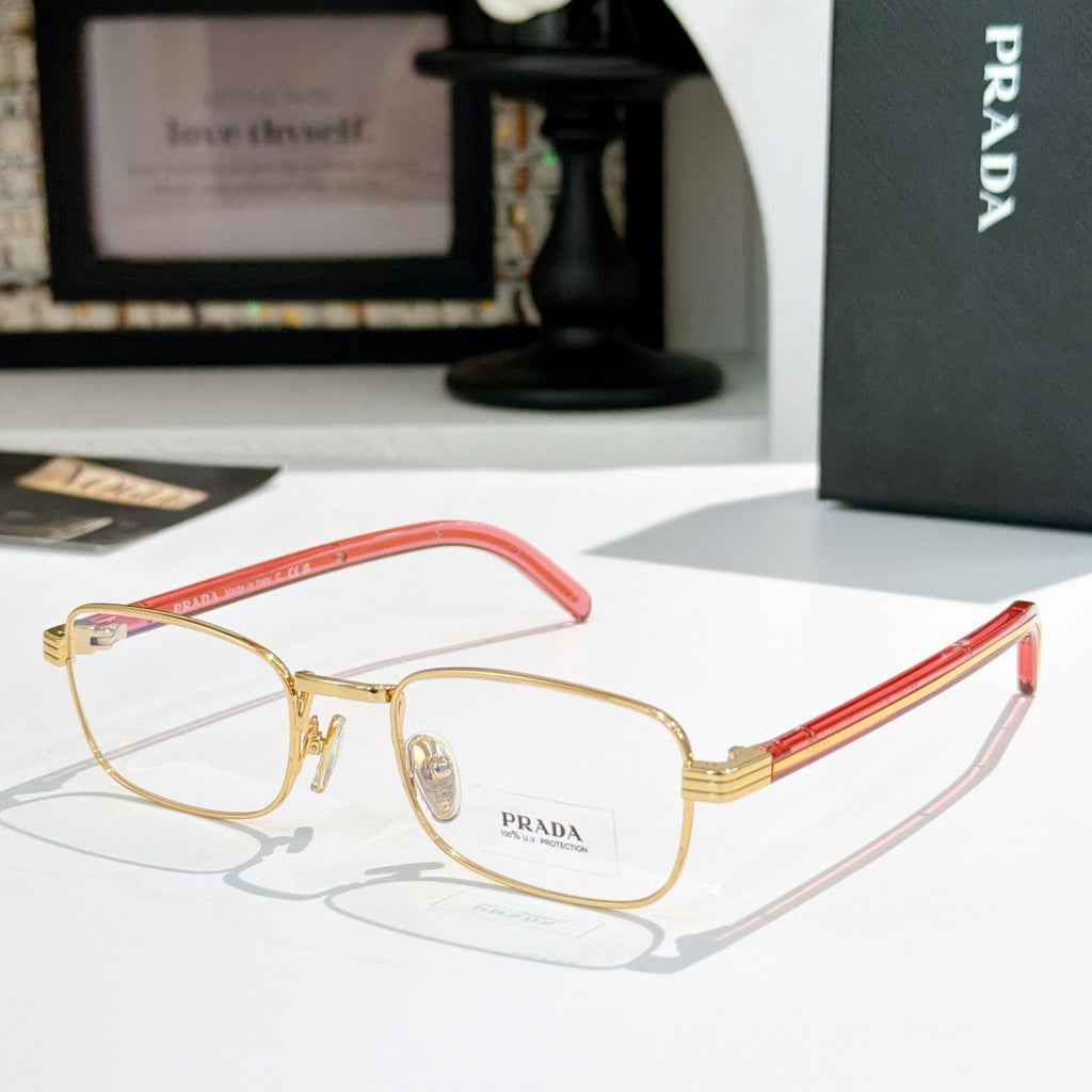 Rectangular eyeglasses with gold metal frame and red striped temples