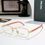Rectangular eyeglasses with gold metal frame and red striped temples