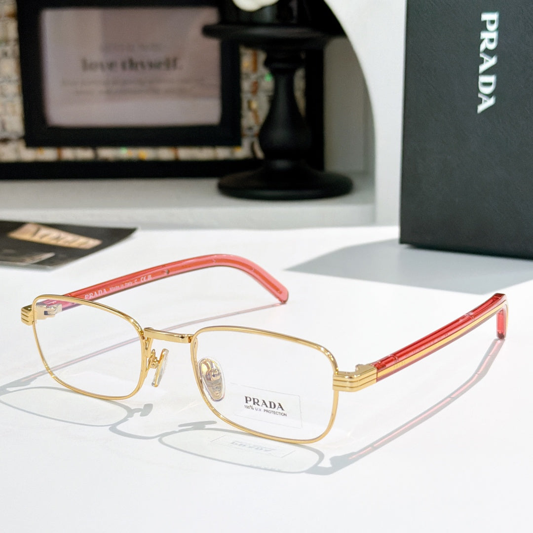 Rectangular eyeglasses with gold metal frame and red striped temples