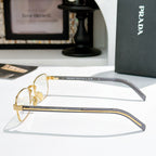 Rectangular eyeglasses with gold frame and blue-gray striped temple arms