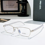 Rectangular eyeglasses with silver metal frame and clear lenses
