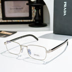 Rectangular eyeglasses with silver metal frame and dark striped temples