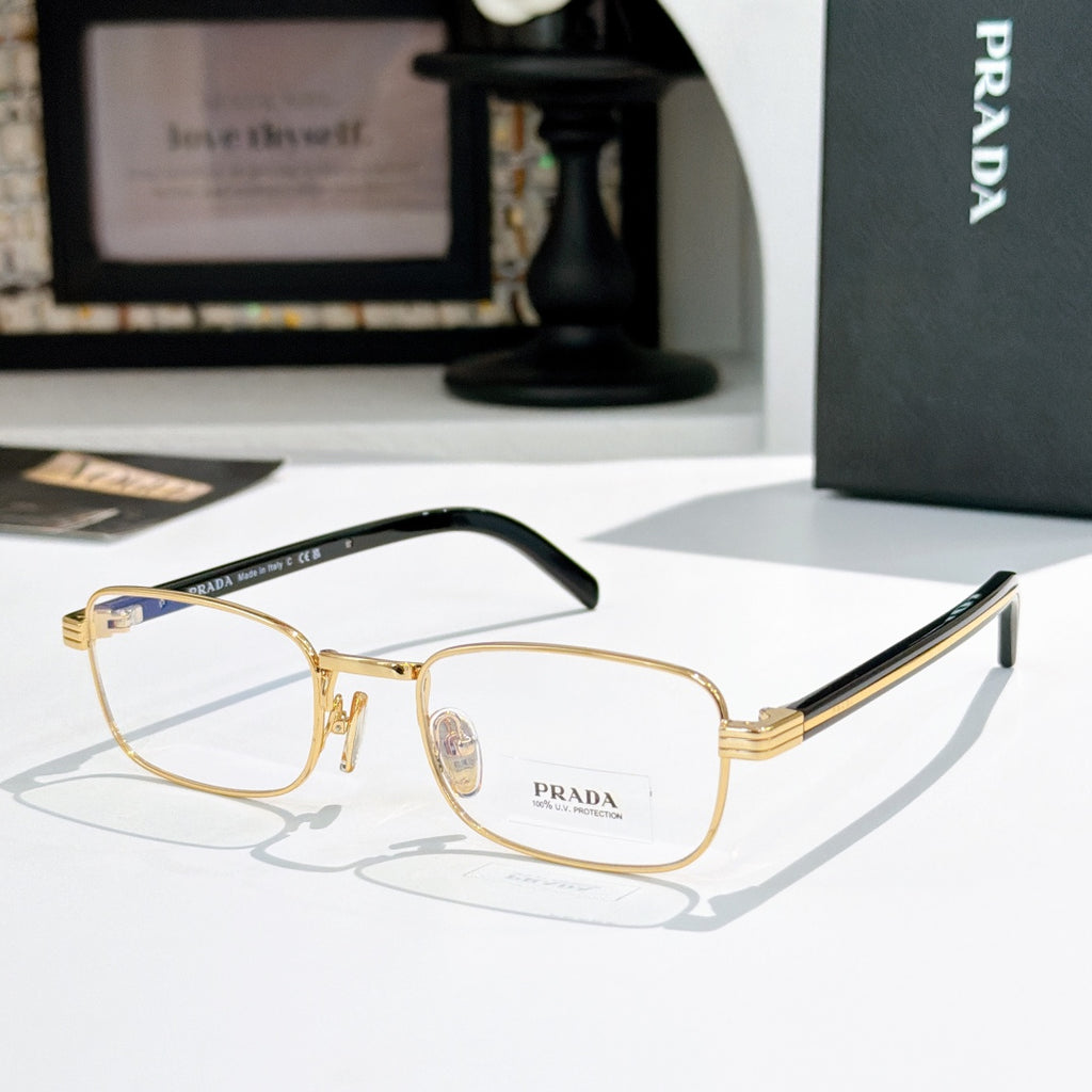 Rectangular eyeglasses with gold metal frame and black striped temples