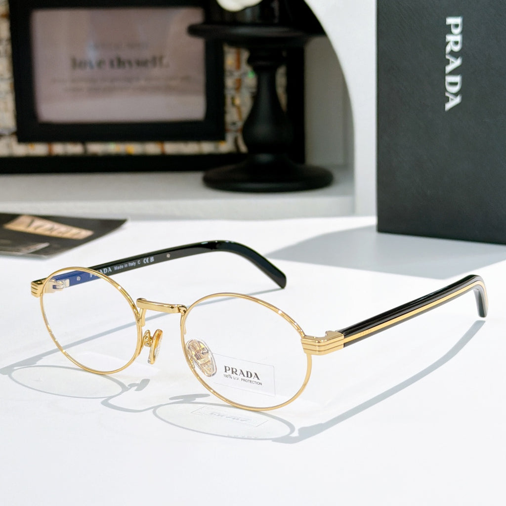Prada eyeglasses with round gold frames and black striped temples