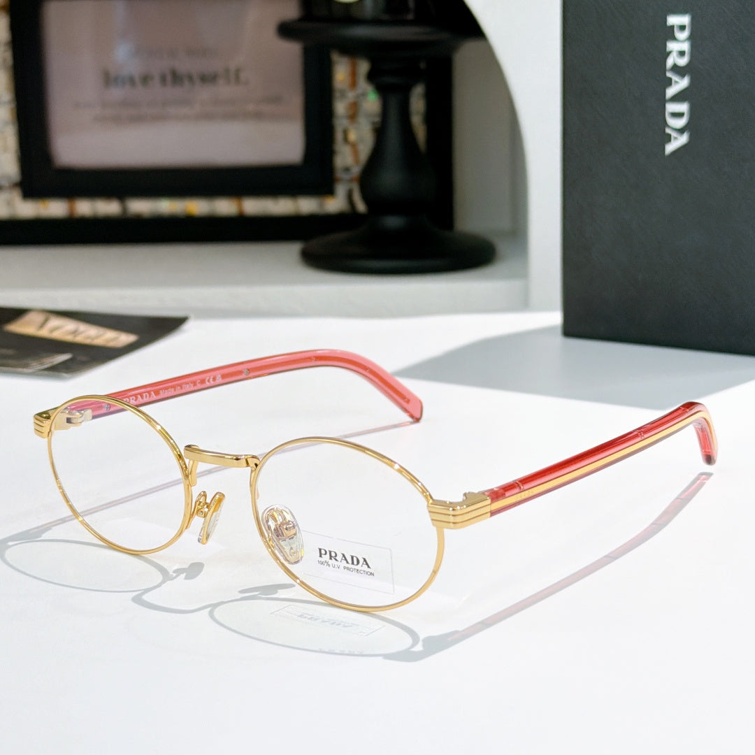 Prada eyeglasses with round gold frames and red striped temples